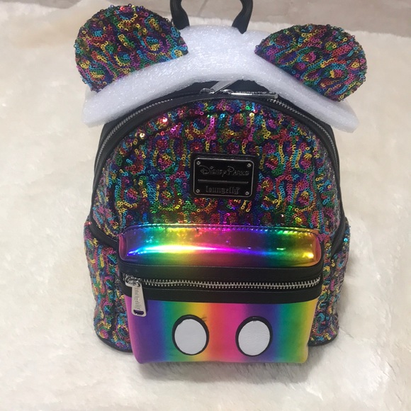 Disney Handbags - NWT Last One! Disney Loungefly Rainbow Backpack